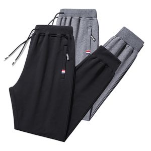 Pantalons décontractés printemps automne hommes mode Fitness bas maigres gymnases joggeurs grande taille survêtement pantalons de survêtement 210715