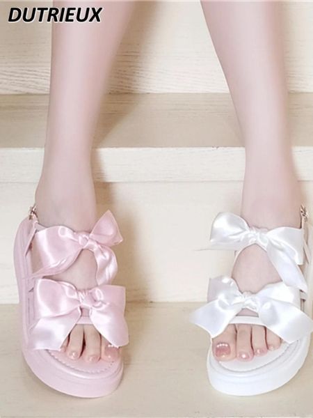 Chaussures décontractées 2024 Fashion dames 'Summer mignon lolita Lolita Style japonais Sandales plates à arc simple pour femmes