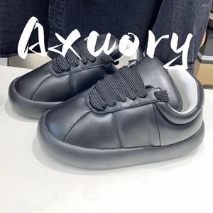 Chaussures décontractées 2024 Chaîne de langue sportive pour femmes Homme Couleur solide en cuir authentique matériau