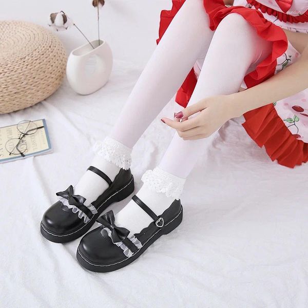 Chaussures décontractées Lace Bow Lolita Chaussures (Femme 2024 Spring British Students Flat Bottoms Cosplay de style collégial polyvalent