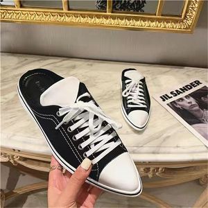 Chaussures décontractées Mules Pantoufles Femmes Tongs Noir Blanc Brossé Talon Bas Diapositives Mode Plat Mule Pantoufle Casual Semelle En Caoutchouc Sangle De Selle Sur Le Dessus 35-40