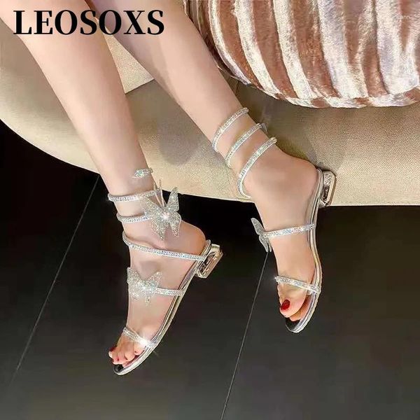 Chaussures décontractées été cristal serpent enroulement sandales talons bas femmes Bling papillon sandale romaine femme doux plat