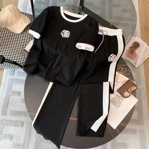 Casual Sports Summer Sets For Women 2 stuks Round Neck korte mouw en brede poot pant outfit tracksuits 240516