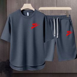Camiseta informal de verano pantalones cortos para hombres establecidos de dos piezas de chándal negro Hip Hop Streetwear con ropa deportiva de gran tamaño