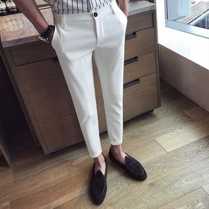 Pantalones blancos casuales pantalones de nueve puntos pies delgados transpirables cómodos de alta calidad de marca de alta calidad pantalones 240513