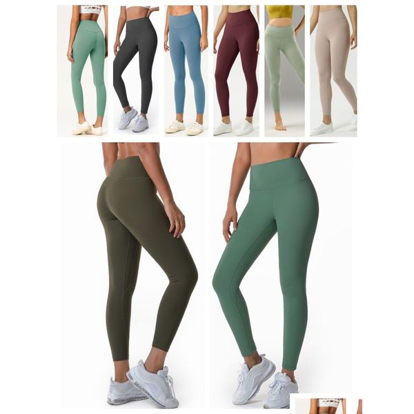 Trajes de catsuit Pantalones de yoga para mujer clásicos con bolsillos Leggings Mini cintura alta Control de barriga Entrenamiento no transparente Entrega de entrega Dhkig