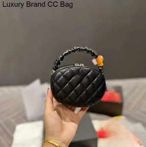 CC Schoudertassen CC tas Luxe Designer tassen fashionbags handtassen zwarte handtas crossbody Klassiek gewatteerd Mini ronde taart schapenvacht make-up Tas dames schouder vi