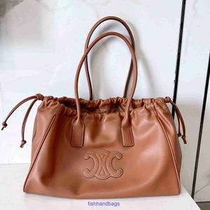 Celins originele Tote Tassen Online Store Triumphal Arch Leather Underarm Bag Grote capaciteit Tote Drawstring Band Mondtas draagbaar met echt logo