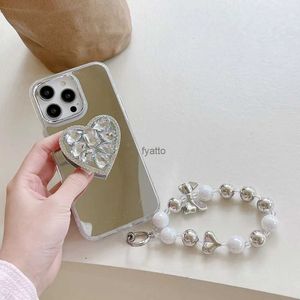 Étuis de téléphone portable Étui de téléphone miroir de maquillage de luxe pour iPhone 14 Pro Max 12 13 11 avec bracelet à nœud chaîne diamant porte-bague coeur couverture coréenne H240326