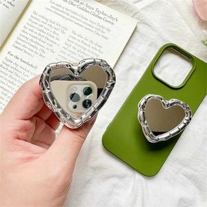 Téléphone portable supporte les supports Ins Metal Love Heart Mirror Téléphone Griptok Grip Tok Tok Honde pour l'iPhone Support de support de support de support de support de support de téléphone pliable mignon