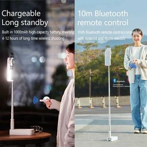 Mobiele telefoonbevestigers houders nieuwe selfie live mobiele telefoonzitting met LED -licht draagbare op zijn kop te vouwen draadloze Bluetooth -bureaubladbodemstandaard
