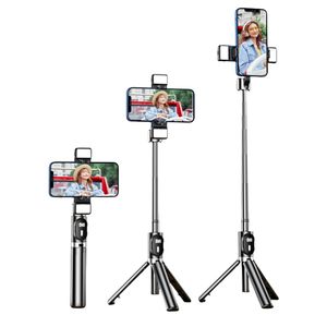 Le téléphone portable monte Selfie Stick Mobile Phone Phone Stand Bluetooth Trépied Intégré Planchers Télescopique Stick Poltomtop portable Bureau