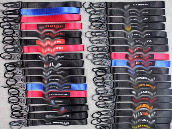 STACHES DE TÉLÉPHONIELLES CHEMPS 100PCS LOGO CORTIOGE MOTOROCYLE SPORT FORME CHEEDCHAIN LANCE DANCE SORDE PROBLÉ CLOP CLÉ CLÉ CLÉSE CL2038348