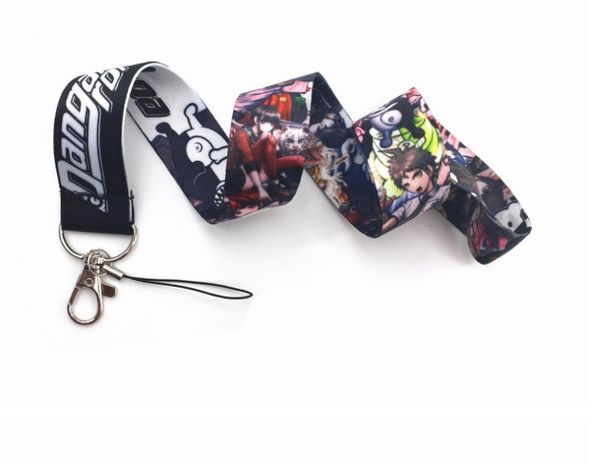 Sangles de téléphone portable Charms 100pcs Cartoon Japon Anime danganronpa Longe de cou Mobile Porte-clés ID Titulaires Badge Chaînes Bijoux Accessoires en gros Nouveau