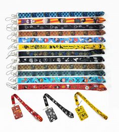 Sangles de téléphone portable Charms 10pcs conception de dessin animé Clés Mobile Lanyard ID Porte-badge cou Corde Porte-clés pour garçon filles en gros Party Good Gifts 2022 # 109