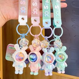 Mobiele telefoonriemen Charms Coole sleutelhangers Astronaut Kawaii sleutelhanger met zonsondergang licht Astronaut Leuke hanger Auto-accessoire Groothandel 2024