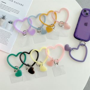 Mobiele telefoons riemen schattige siliconen armband hart hanger kawaii mobiele telefoon lanyard zachte anti-kosten pols ornament universele telefoon met riem 500 stcs