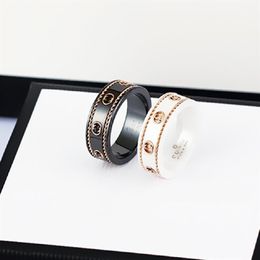 Bague en céramique double lettre bijoux pour femmes hommes or noir et blanc bilatéral creux G anneaux mode célébrité en ligne coup192h