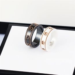 Bague en céramique double lettre bijoux pour femmes hommes or noir et blanc bilatéral creux G anneaux mode célébrité en ligne coup278p