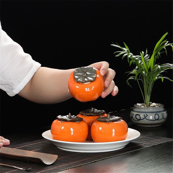 Boîte à café en céramique en forme de kaki en forme de kaki Bocal scellé au thé vert Puer Mini boîte de rangement pour le thé Oolong préféré