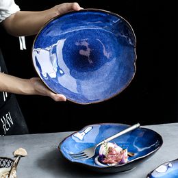 Assiette en céramique Plats irréguliers Série de vaisselle Plaque de nourriture occidentale Plaque de salade de glaçure bleue européenne Plat principal Fournitures de cuisine 201217