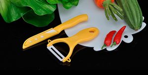 Cerámica conjunto de dos piezas cuchillo de cocina cocinero del bebé sano suplemento alimenticio fábrica de colores vivos conjunto de cerámica de la fruta del melón de cepillado directa