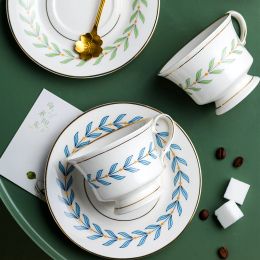 Tasse à thé en céramique et soucoupe Set Gold Rim Tea Coffee tasse coffre en porcelaine Saucer à thé mignon feuille de feuilles latte tasses cadeaux Giftware