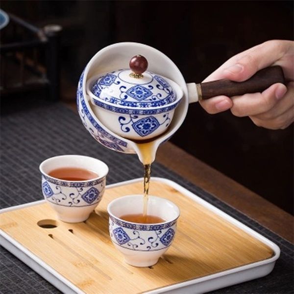 Théière en céramique avec poignée en bois Pot à poignée latérale Ménage Kung Fu Oolong Filtre Thé Maker Creative Black Pottery Teaware 210813