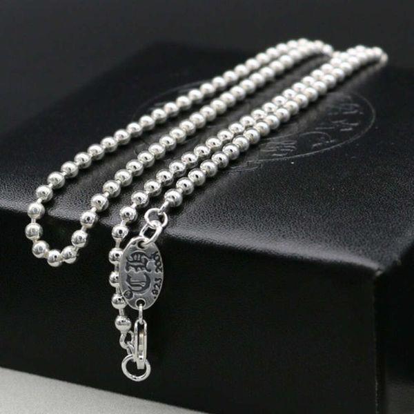 Chrome de collier de croix de créateur de Chaine de perle argentée pure pull pure long polyvalent