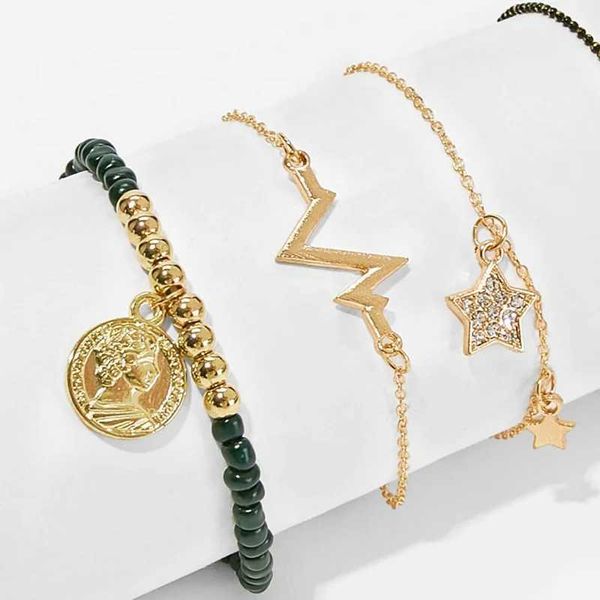 Cadena 4pcs/set de moda ECG Stars Sets Gold Color Rightning Beads Black Beads brazaletes para mujeres accesorios al por mayor