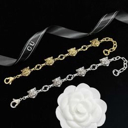 Chaîne designer Double G Stéréo En Relief Tête De Tigre Bracelet Fait Style Ancien Mode Polyvalent Couple Artisanat Cadeau