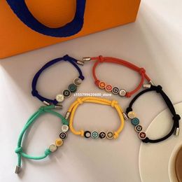 Keten Designer Sieraden 23 Geschenken Eerste Keuze Touw Multi kleur Kralen Armband Nieuwe Vier Blad Gras Lucky Vertegenwoordiger voor Mannen en Vrouwen