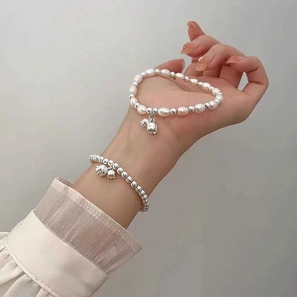 Chain Lily of the Valley Pearl Bracelet Double couche Bracelet Perle pour femmes conception de conception Bracelet de charme de bijoux coréen Y240420