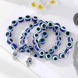 Chaîne New Blue Eye Resin Bracelet Temperament Casual Hip Hop Series Hip Hop Personality Fatima Palm Devil Blood Eye Bround Bracelets Party Bijoux Y240420