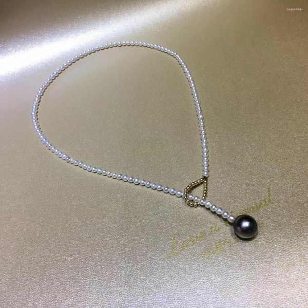 Collier de perles noires et blanches de la mer du Sud avec un design charmant 18 pouces