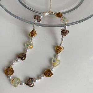 Chaînes collier de perles de verre Style européen américain personnalité mode couleur chaude collier os chaîne Mme accessoires de voyage