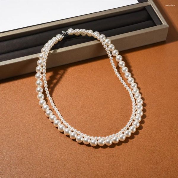 Chaînes INS Français Strong Light Round Double Couche Collier de perles Boucle de poitrine Chaîne d'os Niche Mode Haute Qualité