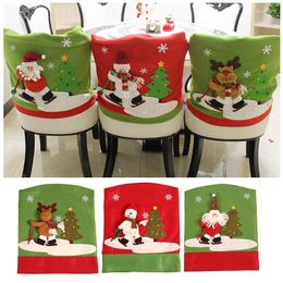 Housses de chaise 1pc couverture de noël poupée tridimensionnelle bonhomme de neige Elk Santa chaises en tissu non tissé TSLM1
