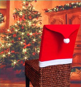 Couvertures de chaise 2023 Santa Claus Red Hat Couverture arrière pour Noël Home Party Holiday Décorations de Noël Table de dîner de Noël