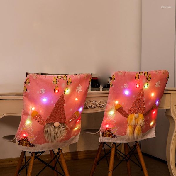 Couvertures de chaise Couverture de Noël de poupée sans visage rose avec décoration de lumière LED pour les ornements de la maison année 2023