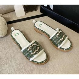 Sandalias de canal elegantes zapatillas francesas Chanells Diapositivas canales de mula casual Beach plana Flip Flip Diseñador de moda para mujeres C. 564
