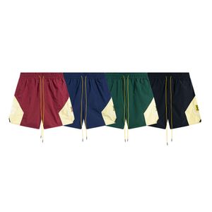 Chaopai Rhude Micro Label Brodery Couleur correspondant à des shorts élastiques attachés pour hommes et femmes Street Street Sports Capris