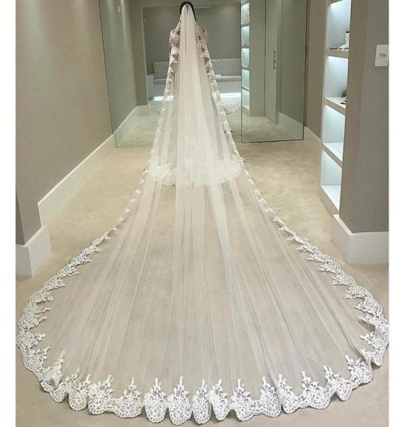 Chapelle 5 M de Long voile pour mariée ivoire blanc dentelle bord de garniture avec peigne un niveau voiles de mariage de haute qualité Tulle Appliques8621410