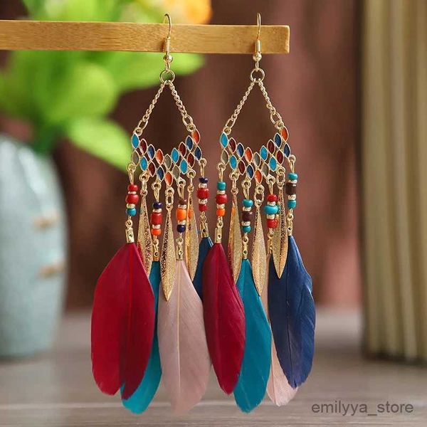 Pendientes bohemios étnicos de plumas para mujer, aretes largos colgantes, joyería de boda, Pendientes con cuentas hechos a mano de Color dorado indio