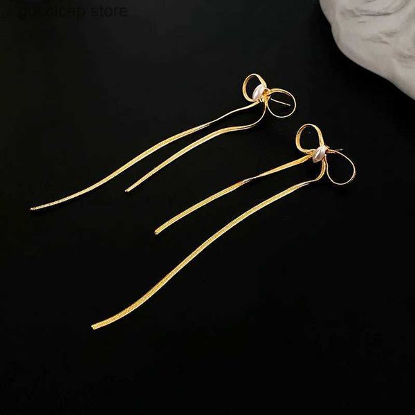 Pendientes de borla de arco de encanto para mujeres Personalidad de moda Color sólido Metal Bowknot Pendientes colgantes Joyas de chapado en oro de moda Y240328