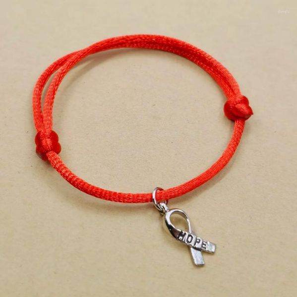 Bracelets de charme 10pcs / lot Hope Ribbon Bracelet Style Athleisure pour femmes Corde rouge réglable à la main Bracelet chanceux DIY Bijoux Cadeau
