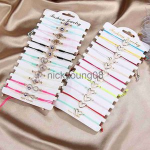 Bracelets de charme 12pcs / lot coeur creux tressé bracelets pour femme fille cristal mauvais œil à la main mince chaîne corde bracelet bijoux de fête x0627