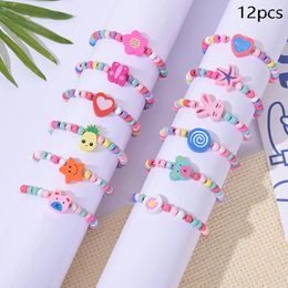 Bracelets de charme 12pcs / pack Cartoon Enfants Perles en bois Bracelet couleur pour fille d'anniversaire Favors Baby Shower Guets Cadeaux Pinata