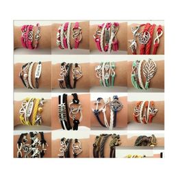 Bracelets de charme 16 styles en cuir créatif Bracelet Bracelet Love Wings Owl MtiLayer tressé pour l'homme des bijoux de mode femme en bk drop de Otpj0