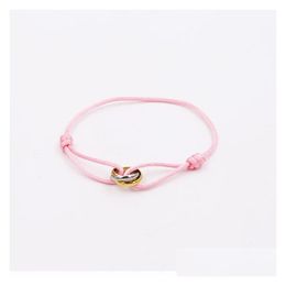 Charm Armbanden 2022 Trinity Ring String Armband Drie Ringen Handriem Paar Voor Vrouwen En Mannen Mode Jelry Beroemde Rop Levering J Dh5Qw